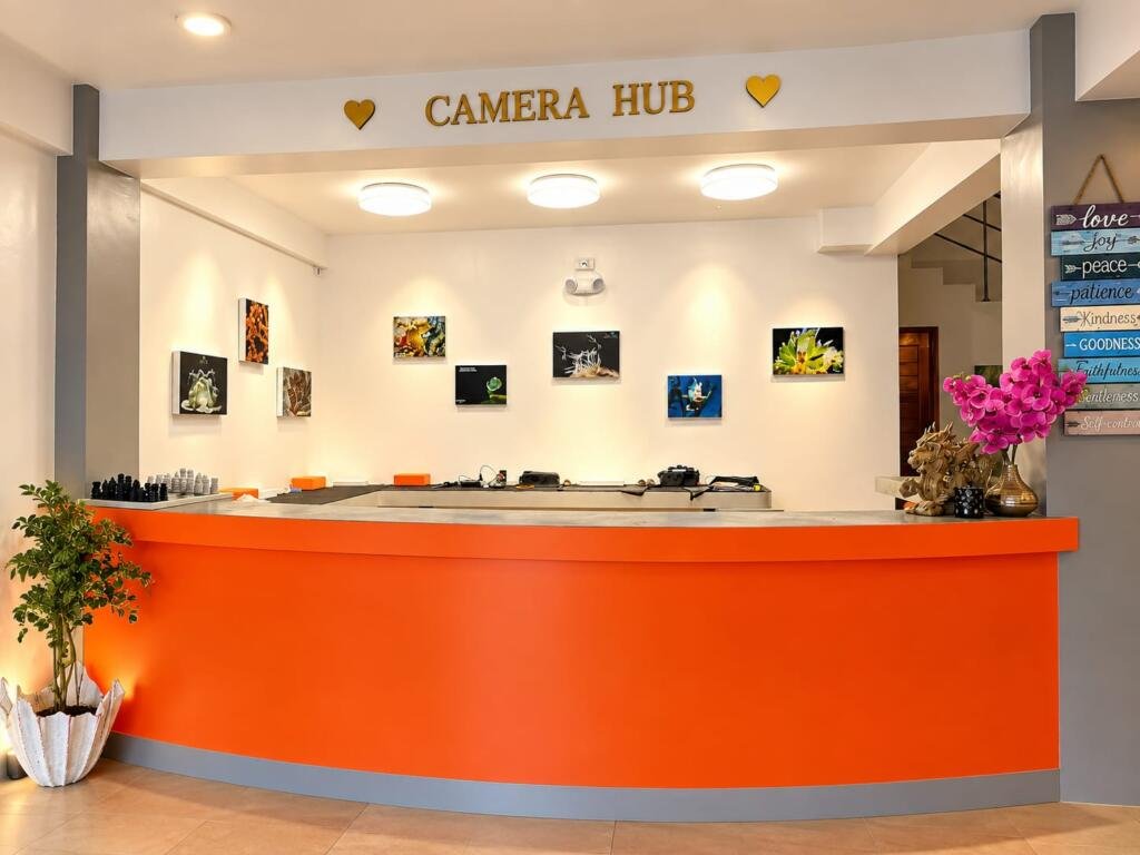 Camera Hub dive centre with macro photo gallery wall, Sunset Cove Resort Romblon Philippines