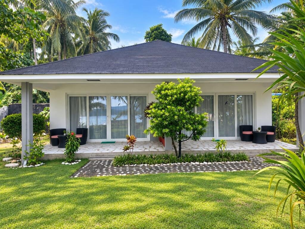 Duplex Deluxe Villa Seaview exterior with lawn and palms, Sunset Cove Resort Romblon Philippines