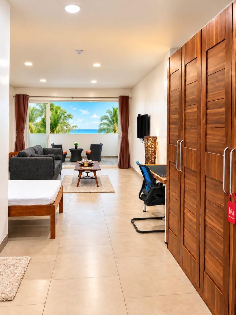 Suite Deluxe Seaview room with lounge, work desk and sea view window, Sunset Cove Romblon